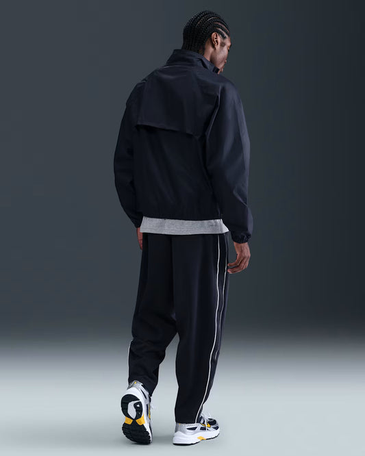 Nike Sportswear Club Oversized track pants made of knitted material (men's)